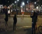 Police use live rounds on protest against police brutality after an attorney was killed by police earlier that day. Bogotá, Colombia from small boy fuck jat pounding police